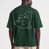 T-shirt vert One Line Art avec visage minimaliste au dos
